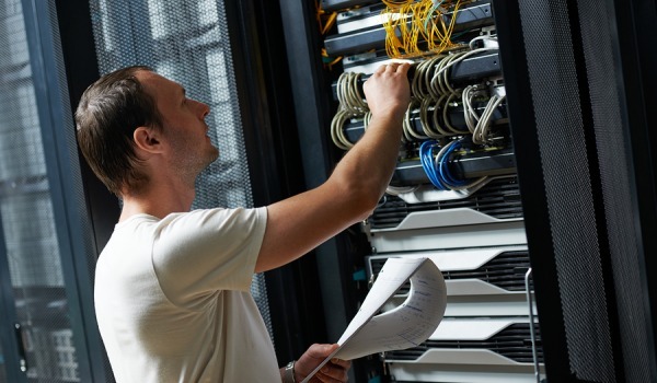 bigstock.network.engineer.working.in_.se_.65646097